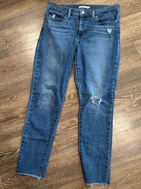 Levi's 311 Blue Distressed Skinny Jeans